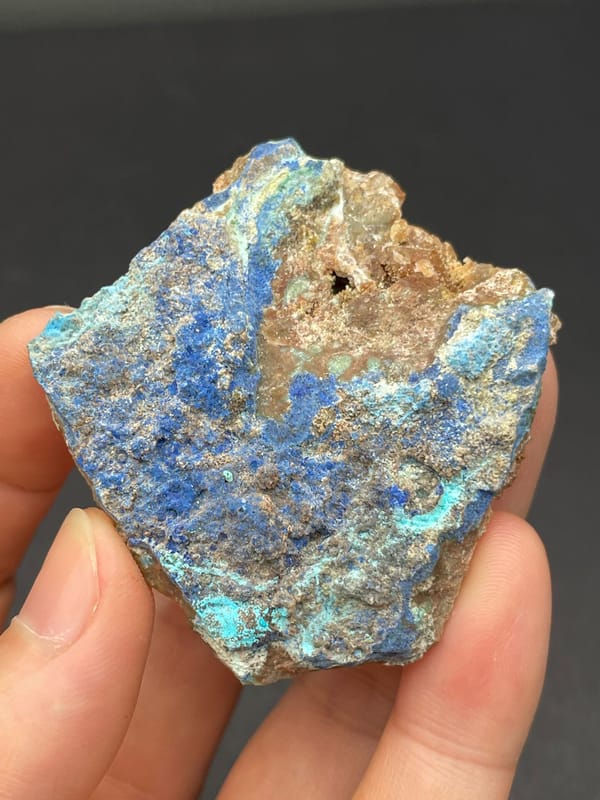 Deep blue azurite crust spread across a rock slab from Yunnan, China, reverse side