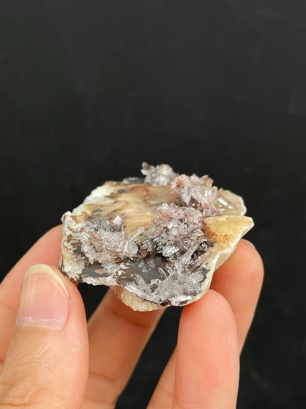 Cream creedite crust with rust-orange staining from Guizhou, China, second angle