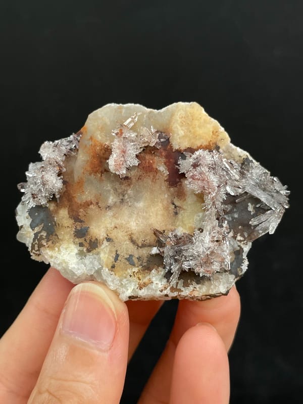 Cream creedite crust with rust-orange staining from Guizhou, China, reverse side