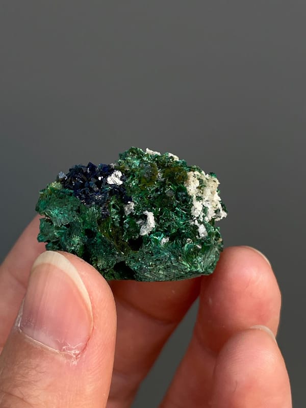 Deep blue azurite crystals in green malachite from Anhui, China, top view