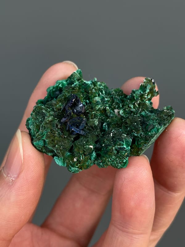Green malachite crust with dark blue azurite patches from Anhui, China