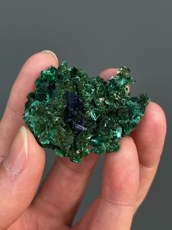 Green malachite crust with dark blue azurite patches from Anhui, China, second angle