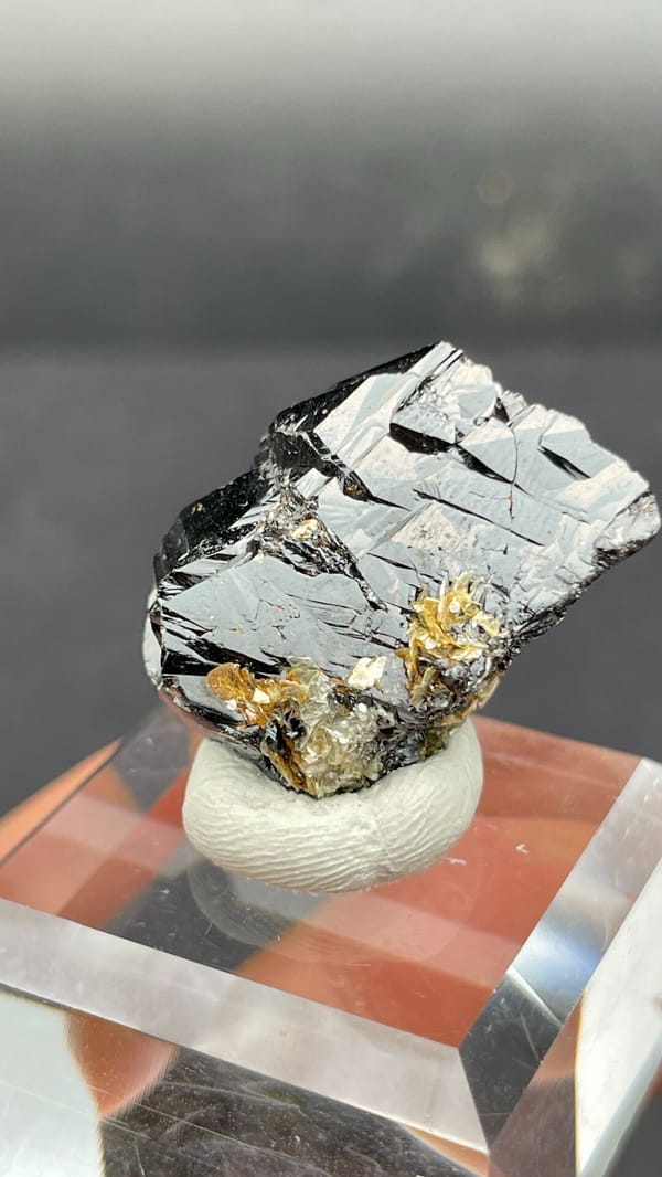 Black lustrous cassiterite crystal group from Xuebaoding, Sichuan, China, second angle