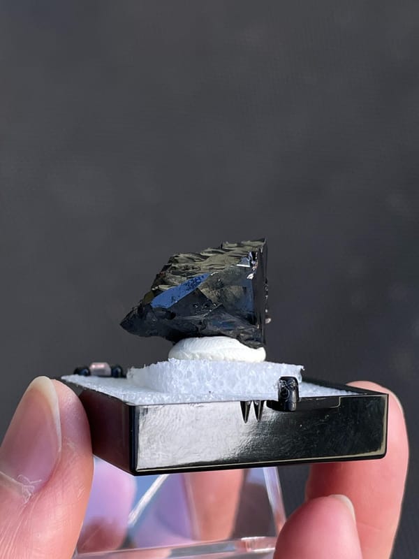 Wedge-shaped black cassiterite crystal from Xuebaoding, Sichuan, China, second angle