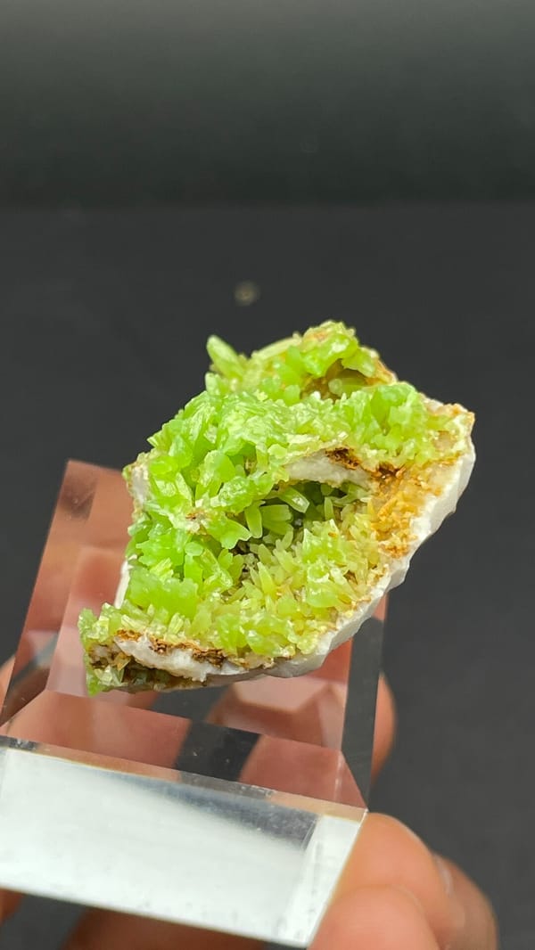 Apple-green pyromorphite crust on tan matrix from Guangxi, China, reverse side