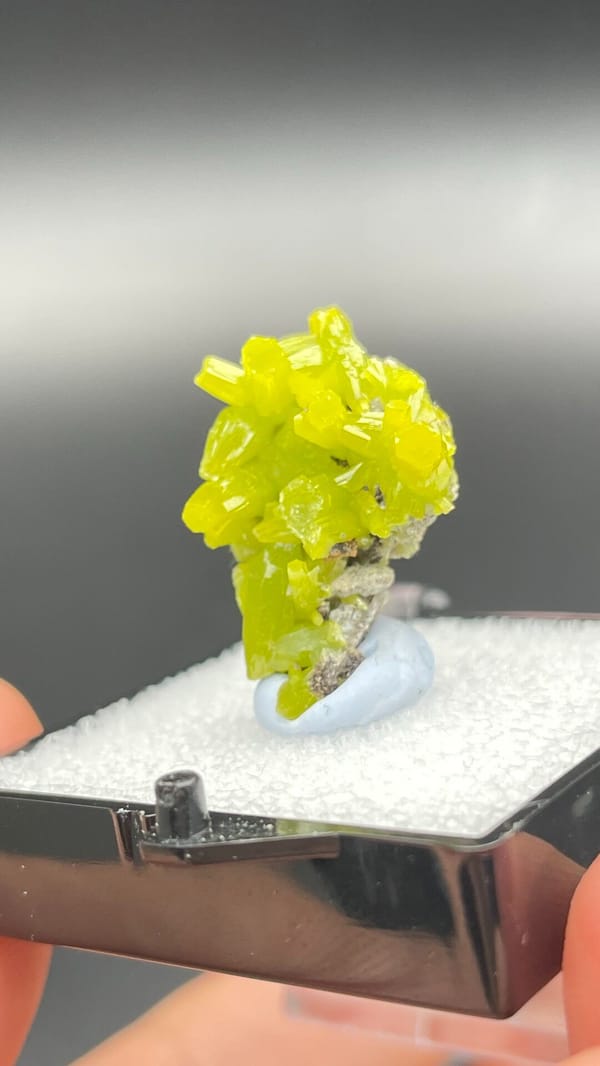 Vivid lemon-yellow pyromorphite cluster on dark base from Guangdong, China