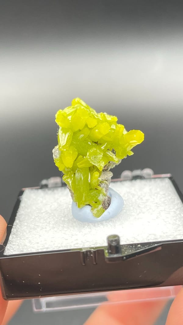 Vivid lemon-yellow pyromorphite cluster on dark base from Guangdong, China, second angle