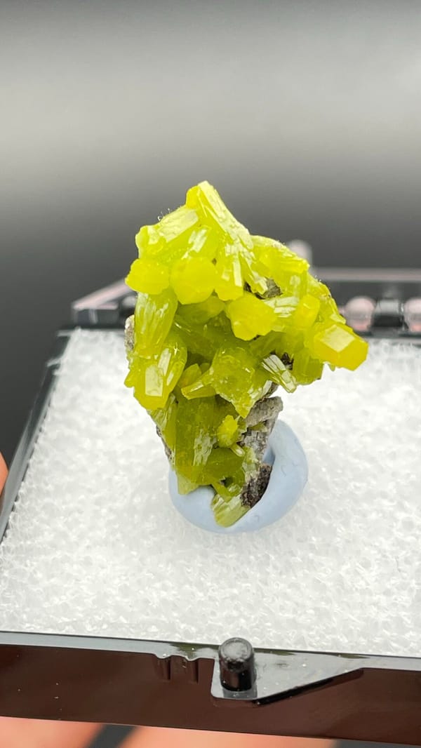 Vivid lemon-yellow pyromorphite cluster on dark base from Guangdong, China, reverse side