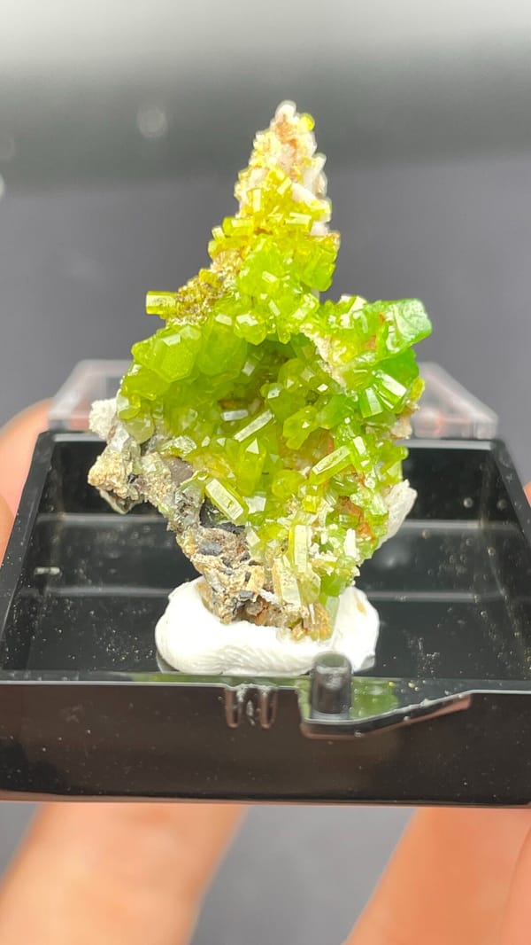 Bright lime-green stacked pyromorphite crystals from Guangdong, China, in a box