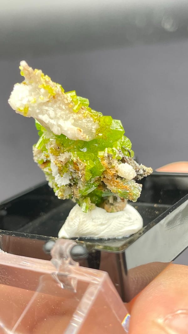 Bright lime-green stacked pyromorphite crystals from Guangdong, China, in a box, reverse side