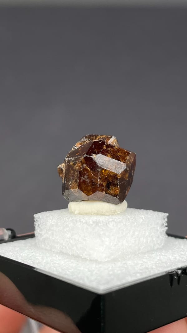 Amber-brown dodecahedral andradite garnet crystal from Handan, Hebei, China