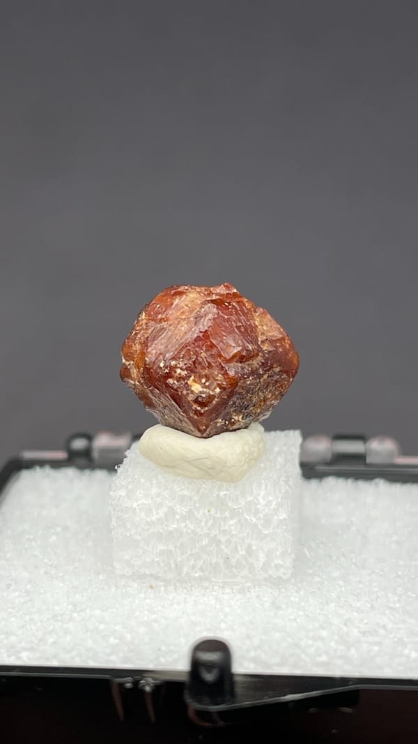 Small reddish-brown dodecahedral andradite garnet from Handan, Hebei, China