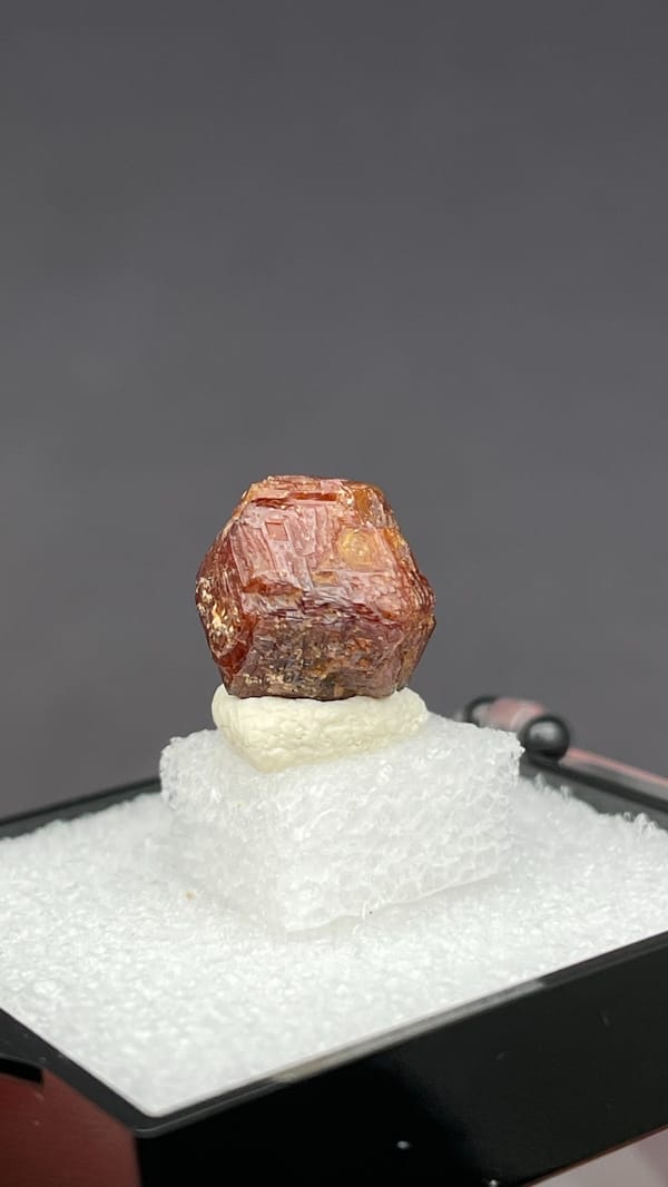 Small reddish-brown dodecahedral andradite garnet from Handan, Hebei, China, second angle