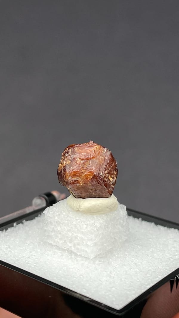 Small reddish-brown dodecahedral andradite garnet from Handan, Hebei, China, top view