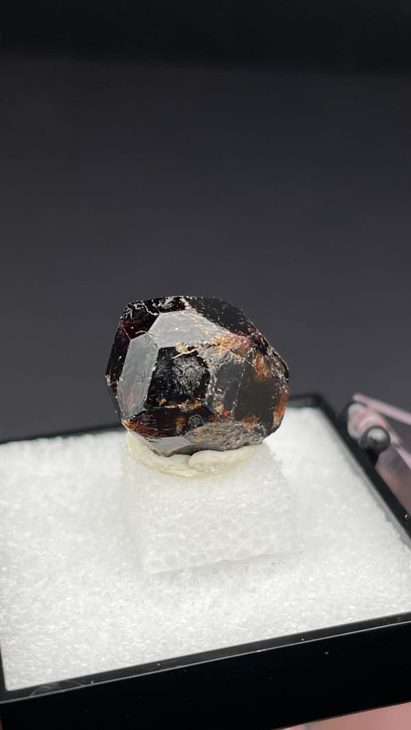 Dark brown dodecahedral andradite garnet single crystal from Handan, Hebei, China, second angle