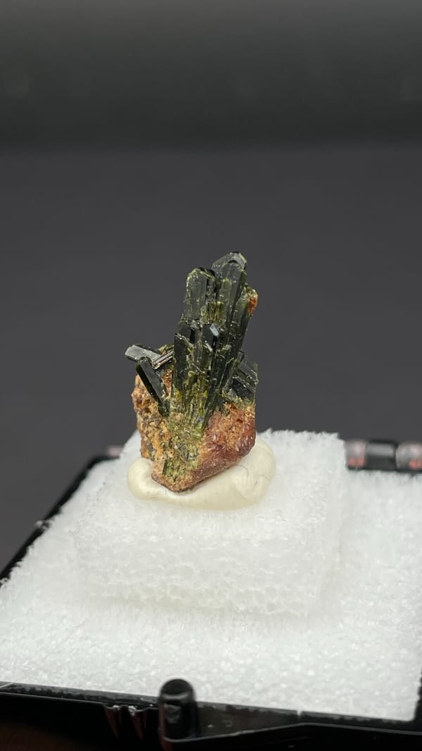 Fan of olive-green epidote blades on brown garnet from Handan, Hebei, China