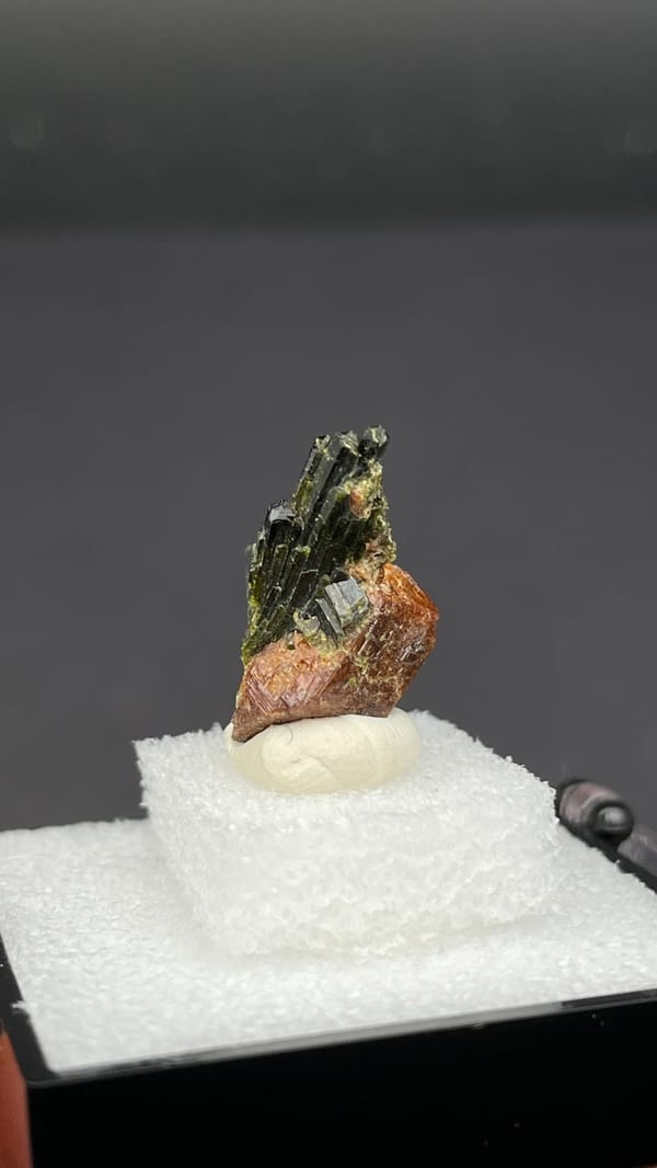Fan of olive-green epidote blades on brown garnet from Handan, Hebei, China, reverse side