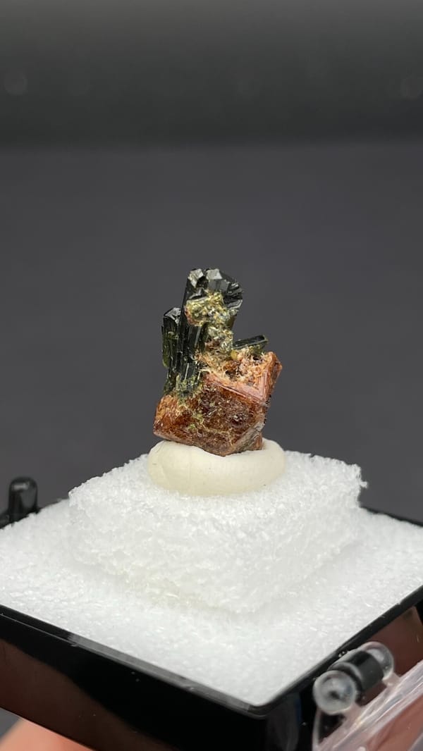 Fan of olive-green epidote blades on brown garnet from Handan, Hebei, China, top view