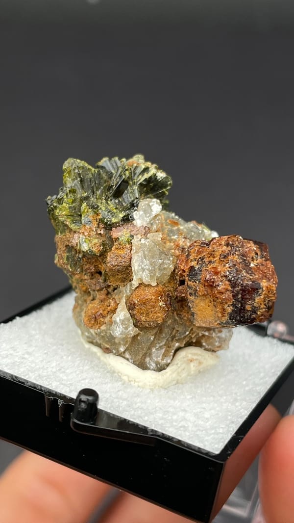Brown garnet dodecahedra with fanned olive epidote blades, Handan, Hebei, China, second angle