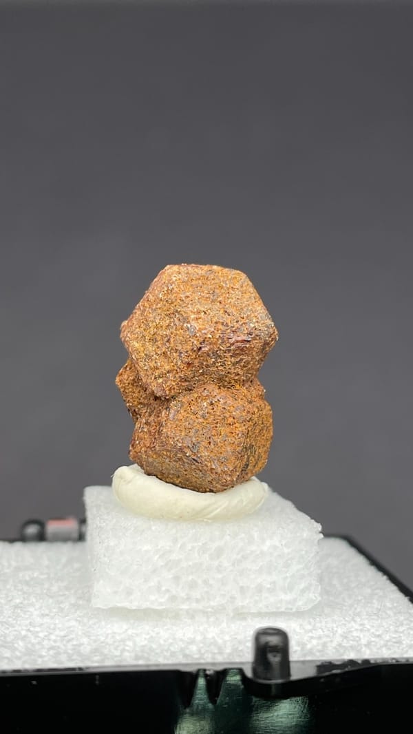Rough orange-brown dodecahedral andradite garnet from Handan, Hebei, China, second angle