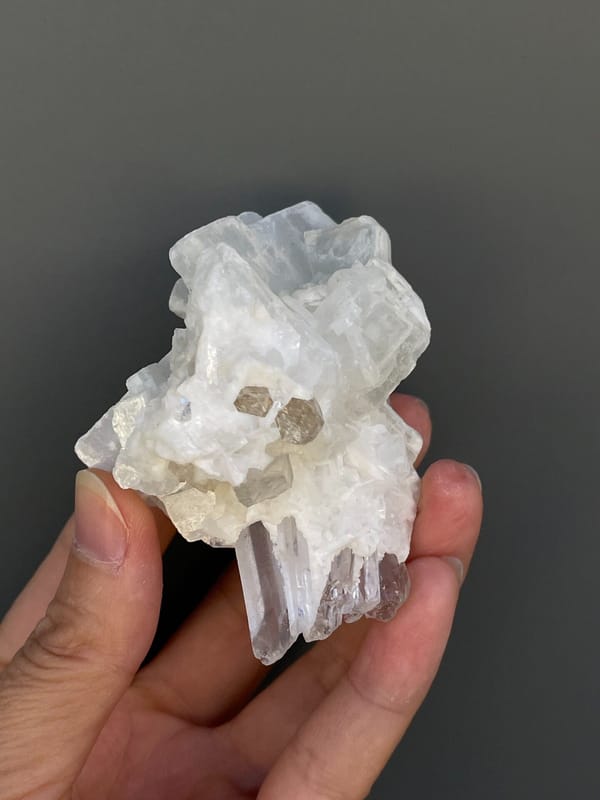 White blocky baryte with clear quartz points from Jinkouhe, Sichuan, China, reverse side