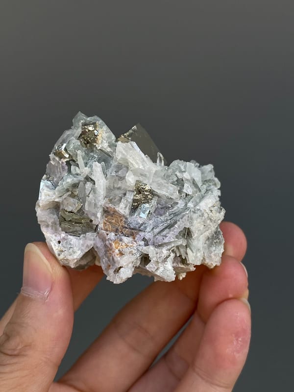 Pale metallic pyrite crystal on grey matrix from Shangbao, Hunan, China, reverse side
