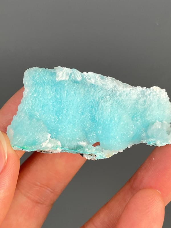 Turquoise-blue fibrous aragonite slab from Sichuan, China, reverse side