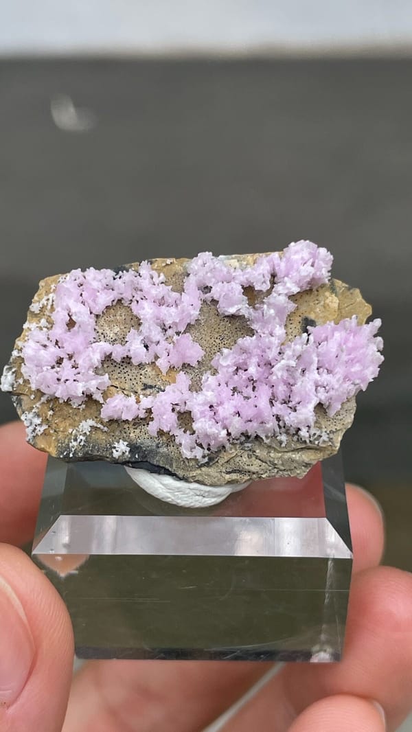 Pale pink aragonite sprays on tan matrix from Yunnan, China, second angle