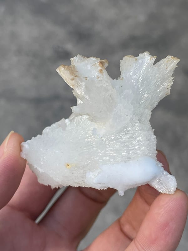 White fibrous aragonite spray from Guizhou, China, second angle