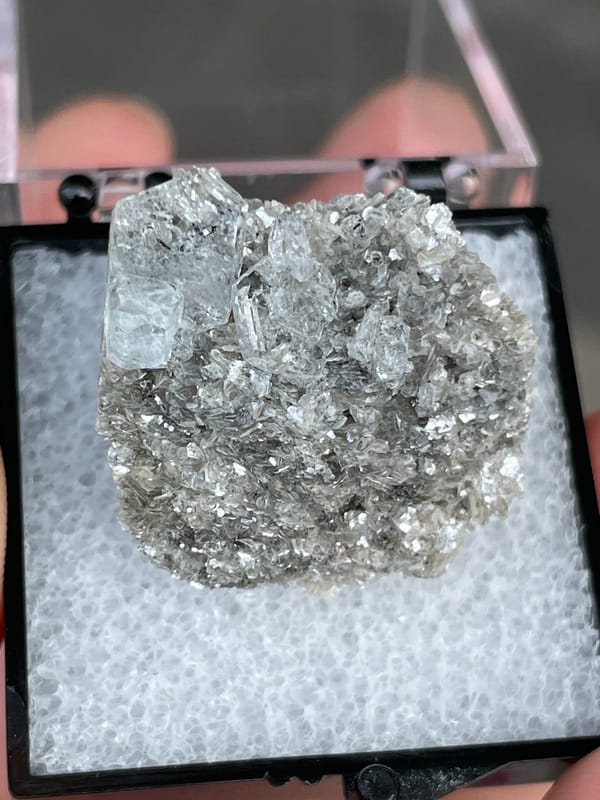 Pale blue aquamarine crystals on a dark mica bed, Xuebaoding, Sichuan, China, second angle