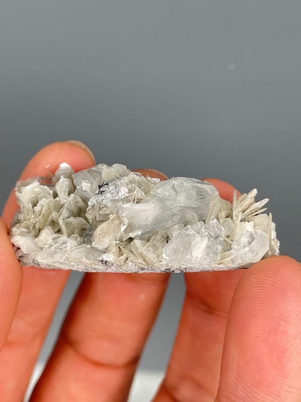 Pale aquamarine crystals in a white mica and quartz plate, Xuebaoding, Sichuan, second angle