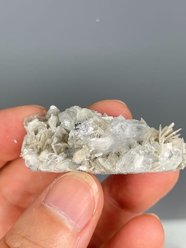 Pale aquamarine crystals in a white mica and quartz plate, Xuebaoding, Sichuan, top view