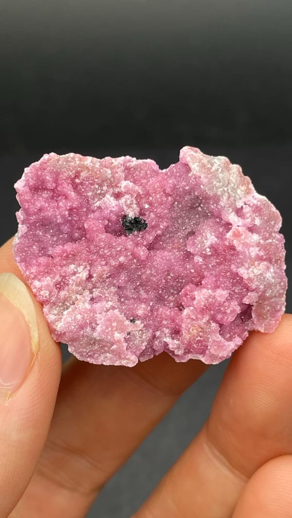 Bright rose-pink cobaltoan calcite crust from DR Congo, second angle