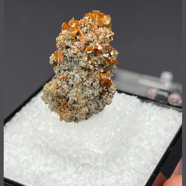 Tabular crystals of orange wulfenite from Xinjiang, one-of-a-kind specimen, photo 3 of 6