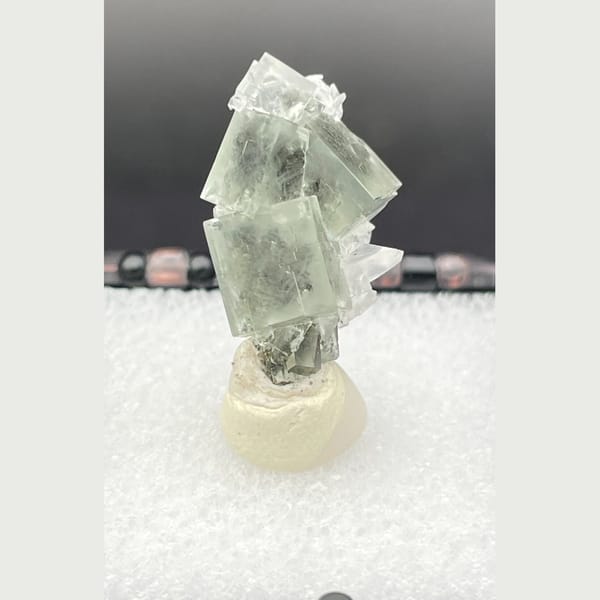 Fluorite specimen from Xianghualing, 2.1 × 1.3 × 1 cm, photo 6 of 6