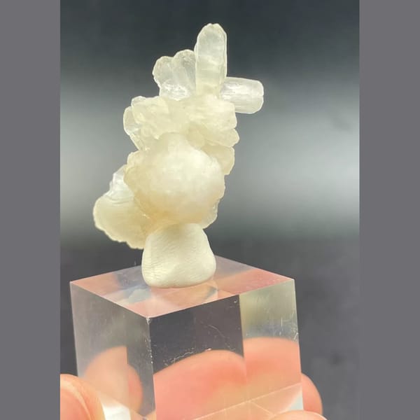 Bow-tie stilbite crystal cluster from India — detail view