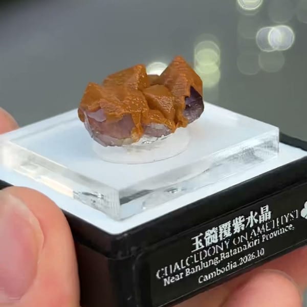 Amethyst points coated in orange chalcedony from Ratanakiri, Cambodia — alternate view