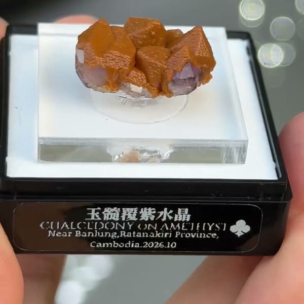 Amethyst points coated in orange chalcedony from Ratanakiri, Cambodia — alternate view