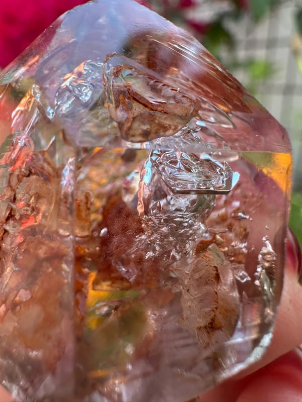 Transparent skeletal quartz with rust-red material from Namibia, specimen view 3