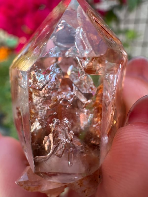 Transparent skeletal quartz with rust-red material from Namibia, specimen view 4