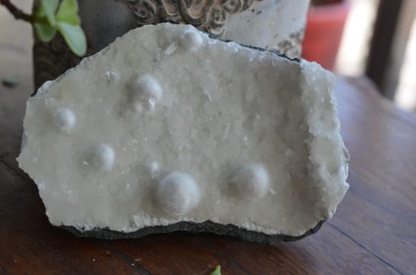 Okenite (source-recorded) from India, individual mineral specimen view 1