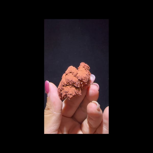 Red clay-coated calcite from Yunnan — additional angle