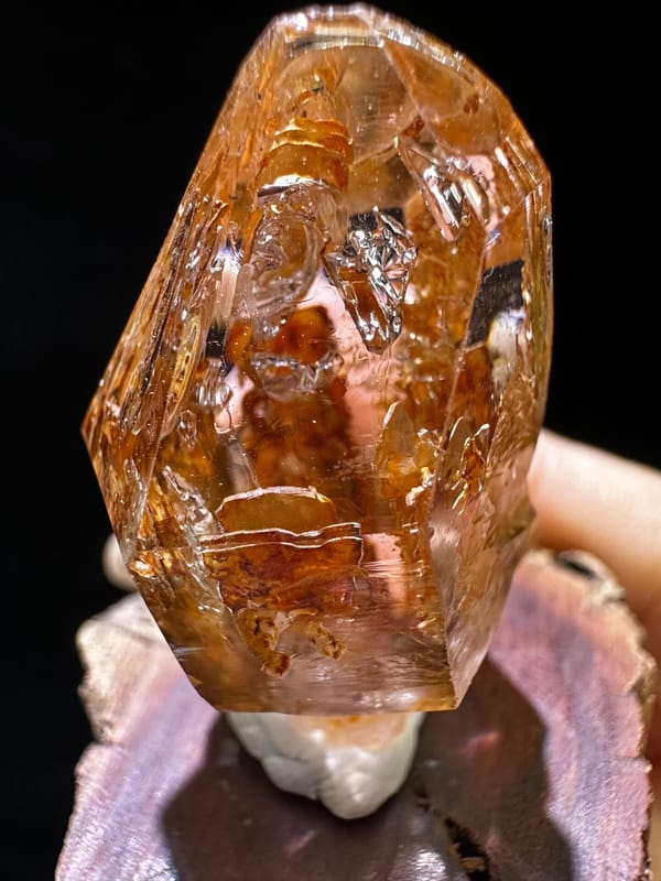 Rust-orange skeletal quartz scepter with clear facets from Namibia, specimen view 2