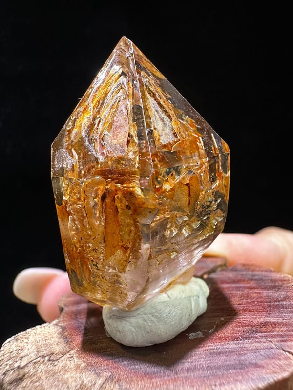 Rust-orange skeletal quartz scepter with clear facets from Namibia, specimen view 3