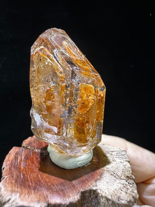 Rust-orange skeletal quartz scepter with clear facets from Namibia, specimen view 4