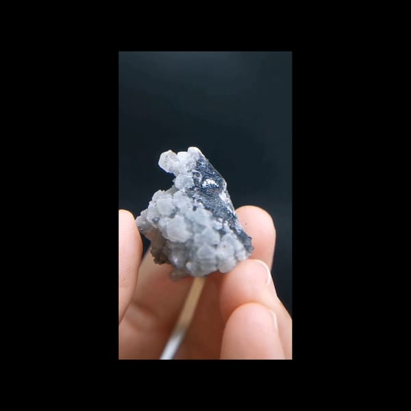 Rose-like calcite with specular hematite from Inner Mongolia — complete front view