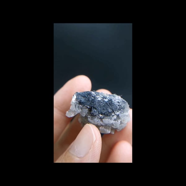 Rose-like calcite with specular hematite from Inner Mongolia — alternate side view