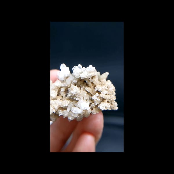 Sparkling white crystal cluster — complete front view