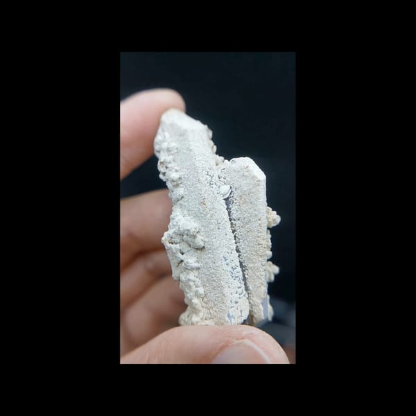 Pale quartz with calcite crust from Inner Mongolia — complete front view