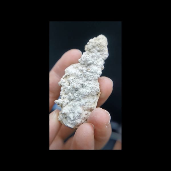 Pale quartz with calcite crust from Inner Mongolia — additional angle